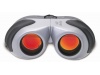 Binculos de lentes vermelhas
