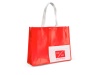 Saco com bolso frontal e alas 140 g/m