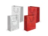 Saco com papel couch com plastificao brilhante