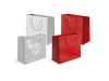 Saco com papel couch com plastificao brilhante